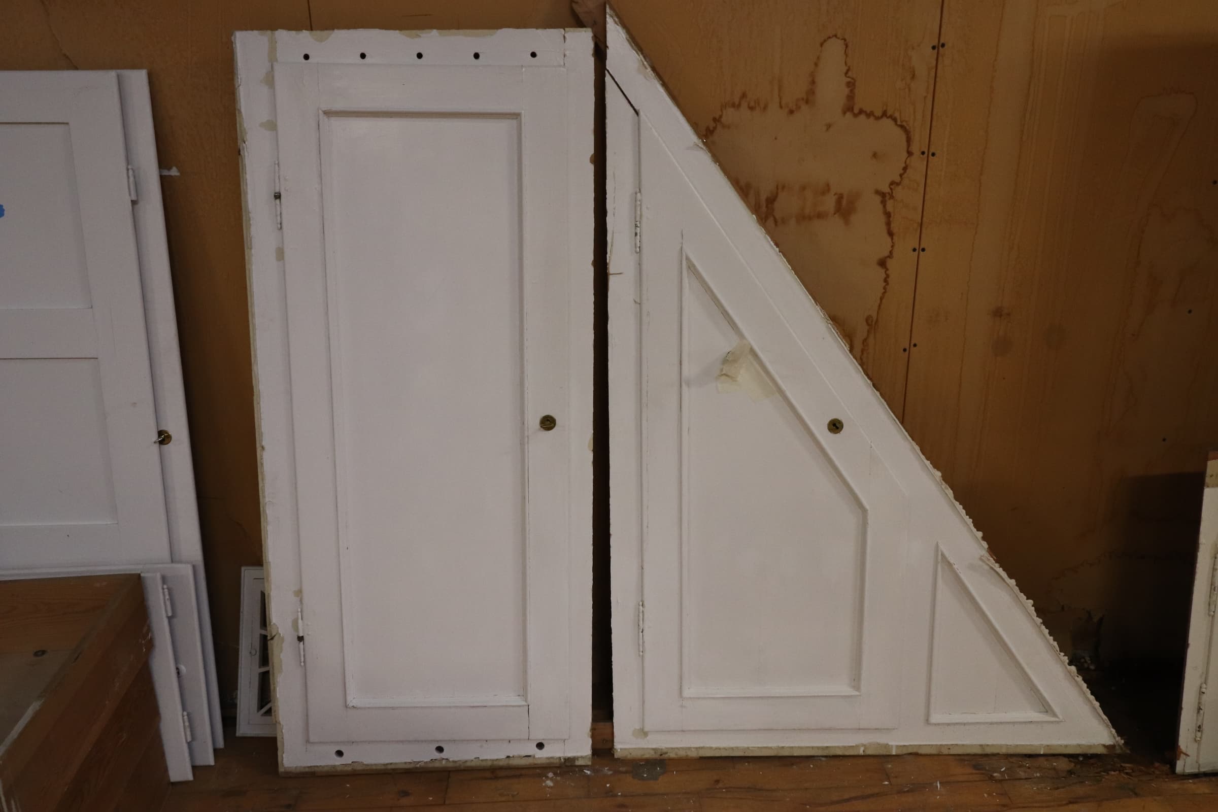 Låger til “rummet” under trappen år 1900 - 1