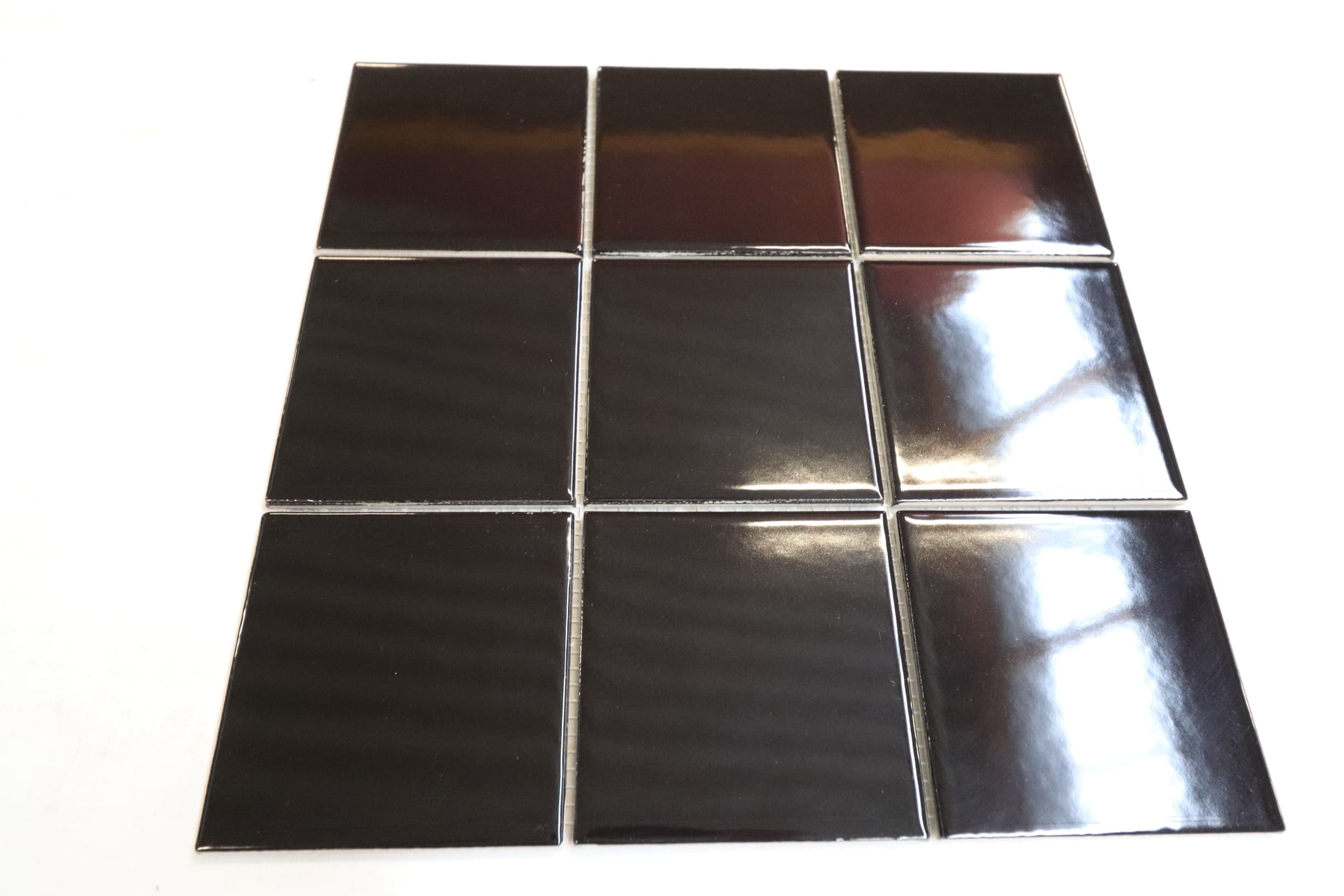 Glaseret keramik flise sort blank 10x10cm. Pris pr m2 - 1